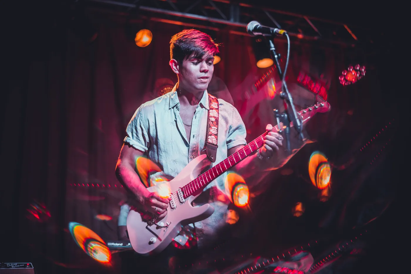 Luke playing guitar at the Beachland Ballroom